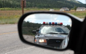 Police in Mirror 300x191 You Have the Right to Remain Silent